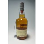 A bottle of The Edinburgh Malt Glenkinchie Single Malt Scotch Whisky, aged 12 years, distilled at