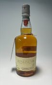 A bottle of The Edinburgh Malt Glenkinchie Single Malt Scotch Whisky, aged 12 years, distilled at