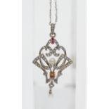 An Edwardian ruby, diamond and pearl set pendant on fine chain
