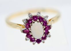 An 18ct yellow gold diamond and opal cluster ring, size W.