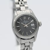 Rolex, a ladies stainless steel Oyster Perpetual Date wristwatch.