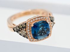 A 14ct rose gold diamond and topaz ring, marked inside Le Vian, size L.