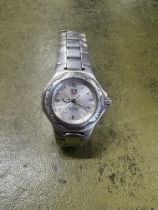 Tag Heuer, a gents stainless steel wristwatch, 200m, with box, guarantee booklet/card dated 8/10/
