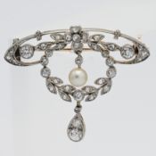 Edwardian diamond and pearl pendant brooch, set in yellow gold.