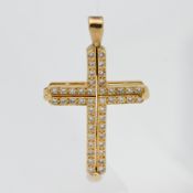 A gold and diamond set cross pendant, 25mm x 20mm.