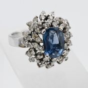 A large sapphire and diamond cluster ring, set 18k white gold, size L/M.