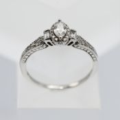 An oval shape diamond marquise ring, set in 18ct white gold, size S.