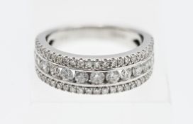An 18ct white gold and diamond three row ring, size M.