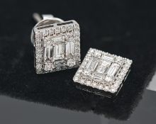 A pair of square shaped diamond cluster earrings, set in 18ct white gold.