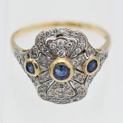 A sapphire and diamond cluster ring, set in 18ct yellow gold, size T.