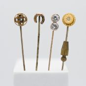 A 15ct gold pin together with two 9ct gold pins and a unmarked pin (4).