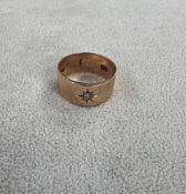 A 9ct gold band ring set with stone, approx 4.78g
