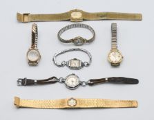 A collection of seven watches including an 18k Bucherer automatic date wristwatch.