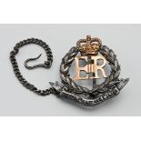 ROYAL MILITARY POLICE 9ct rose gold insert and base metal badge with safety chain