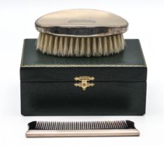 Beautiful brand new green cased grooming set comprising oval silver topped brush and silver spined