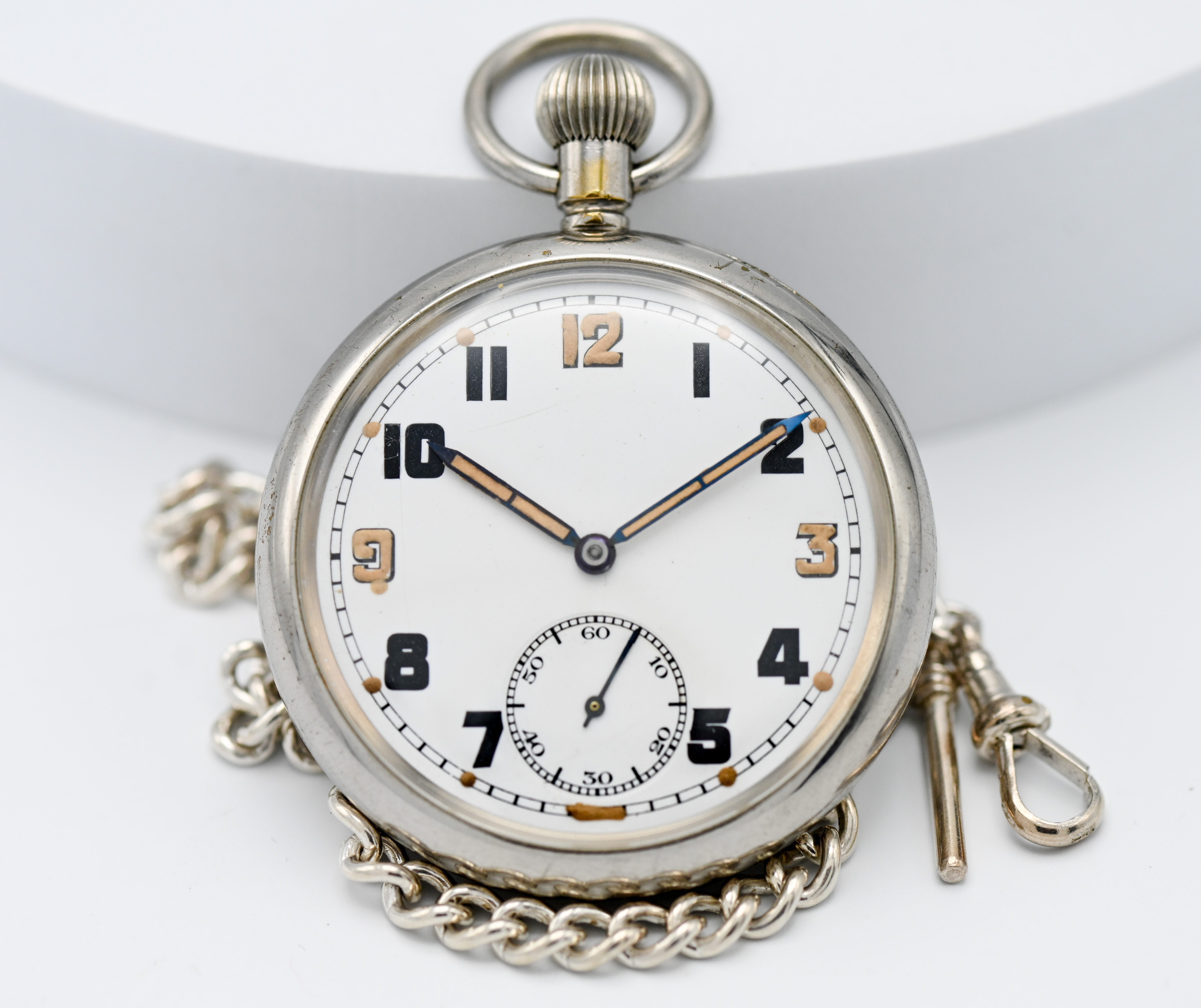 A military pocket watch marked to the back plate GS/TP, 013465 (up arrow with S) together with a