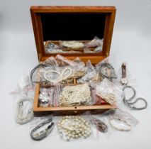 A quantity of costume and dress jewellery including necklaces, beads, earrings etc together with a