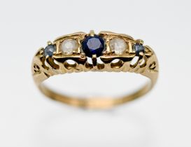 An antique 18ct yellow gold five stone ring, size G.