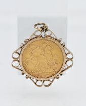 A Victoria full sovereign, dated 1892, mounted, approx. 10g