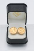 A pair of 9ct gold half sovereign cufflinks dated 1911 & 1914, total weight 14g, with original