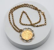 A 1910 Edward VII full sovereign mounted, on a 9ct gold chain, approx. 18.3g total.
