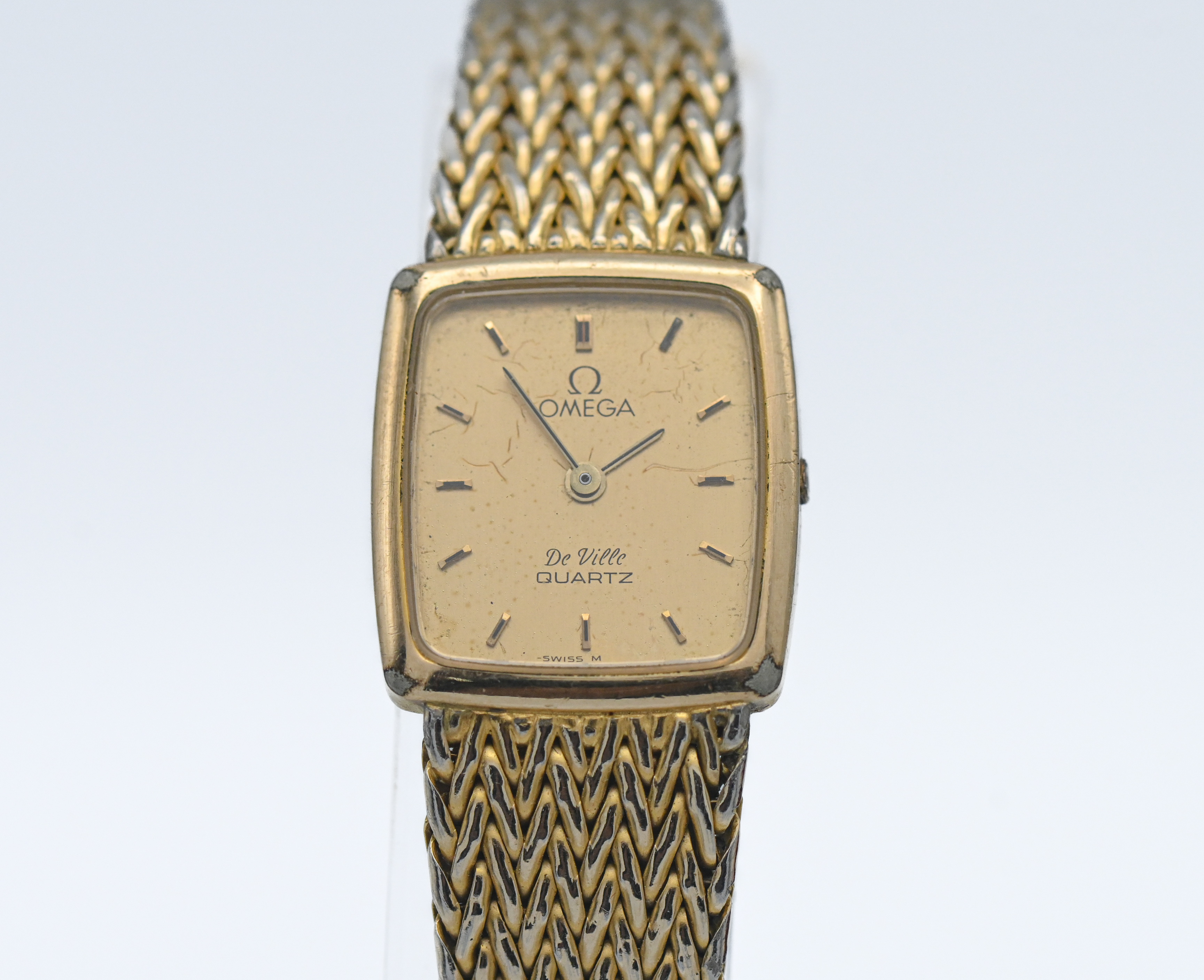 Omega, a ladies gold plated De Ville quartz wristwatch, backplate number 1387 (crown missing),