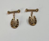 A pair of 18ct yellow gold Chinese design cufflinks, total weight approx. 7.3g.