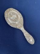 A silver hand mirror, Birmingham hallmark, circa 1904-1905, maker mark J&C.