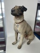 An Austrian painted Terracotta model of a Jack Russell, circa 1900, in a seated position with