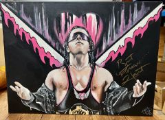 An oil on canvas of Bret Hart, Wrestler, also signed by himself, unframed.