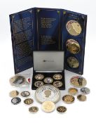 A mixed collection of gold plated coins to include God Save the Queen, Five pounds 'The Life and