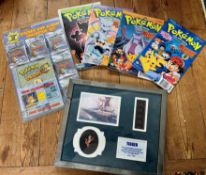 Four Pokemon monthly magazines together with a sticker and album collectors set also a