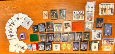 A collection of various military miniature figurine, accessory sets and other military related
