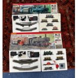 Two Hornby electric train sets R1000 GWR 0-6-0 Pannier tank locomotive, two GWR four wheel