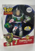 A Disney Pixar's Toy Story Electronic Turbo Glow Buzz Lightyear deluxe figure, approx. 36cm x