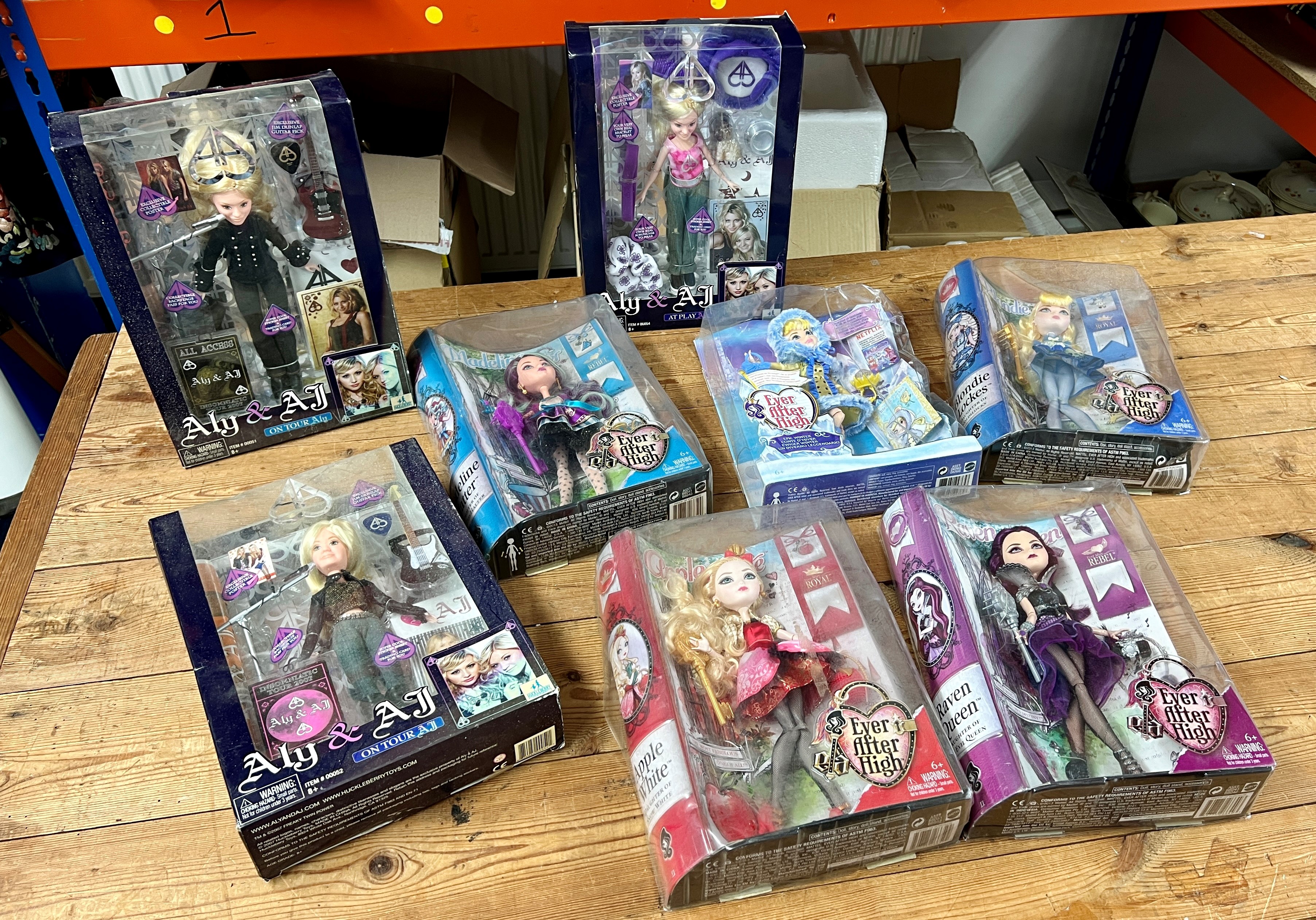 Three 'Aly & AJ' on Tour dolls, boxed together with five 'Ever After High' dolls, boxed (8).