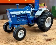 One Ford 8600 model tractor in blue, 20cm by 35cm