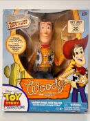A Disney Pixar's 'Toy Story' talking figure of Woody the Sheriff, 'Woody's Roundup' tv show deluxe