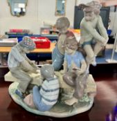Nao by Lladro - a limited edition large porcelain Group Figure entitled Boys Playing Cards, The