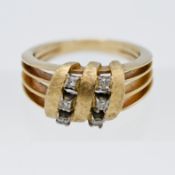 A yellow gold six stone abstract diamond ring, of Dutch origin, size N, approx. 5.4G.