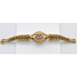 An impressive 18ct yellow gold sapphire and diamond feathered construction design cuff bracelet