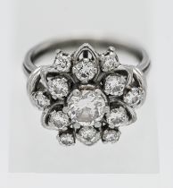 An impressive diamond set cluster ring, Size Q.