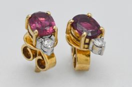 A pair of 18ct ruby and diamond earrings.