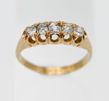 An 18ct yellow gold five stone diamond ring, (old cut diamonds), size K.