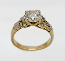 An 18ct yellow gold diamond ring, centre stone approx. 1.30ct modern brilliant cut diamond