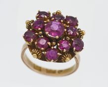 A large high carat yellow gold, possibly Thia, ruby cluster ring, head size approx. 19mm, size K/L.