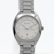 A ladies Gucci diamond set wristwatch, with date, boxed as new, purchase date 7th May 2021