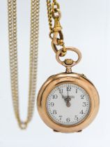 A 14ct gold fob watch on a 14ct gold chain marked G,Schwartz in Bernburg. Case diameter 31mm approx.