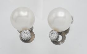 A pair of pearl and diamond clip on earrings (The Pearl Company)