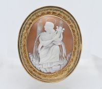 An antique gold cameo brooch, measuring 67mm x 55mm.